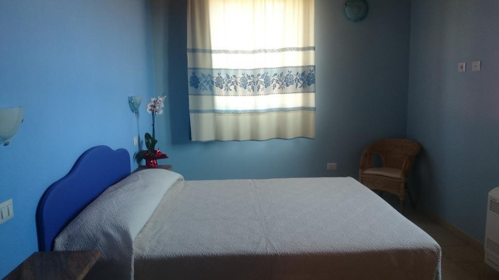 La Corte Dei Rei Lejlighedshotel Castiadas Værelse billede