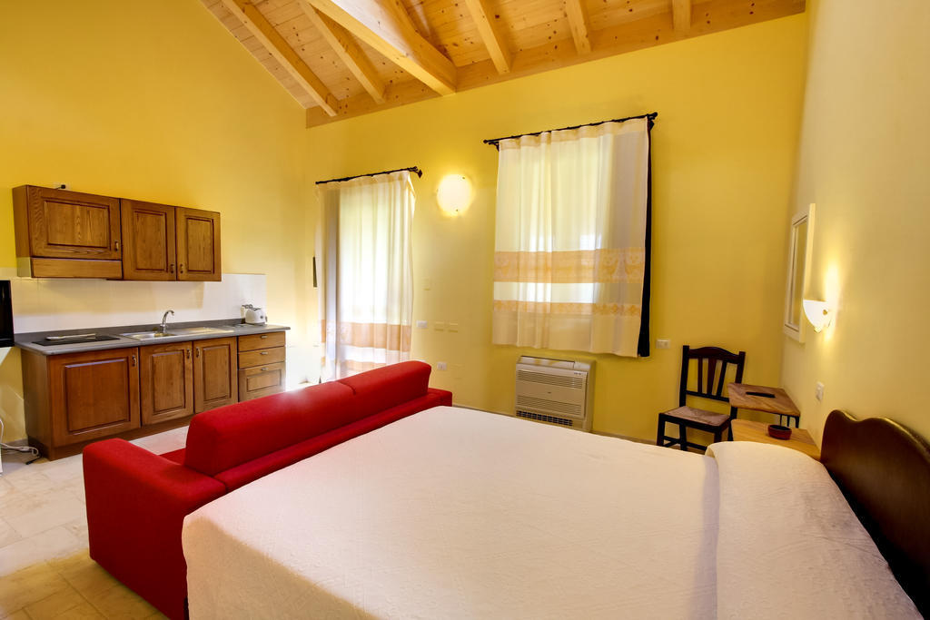 La Corte Dei Rei Lejlighedshotel Castiadas Værelse billede