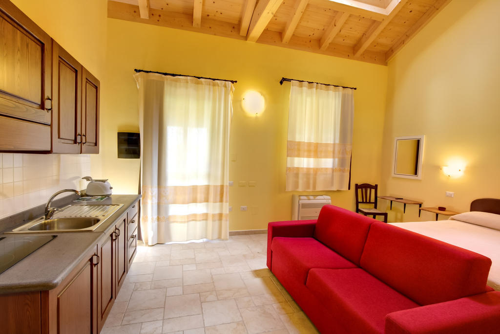 La Corte Dei Rei Lejlighedshotel Castiadas Værelse billede